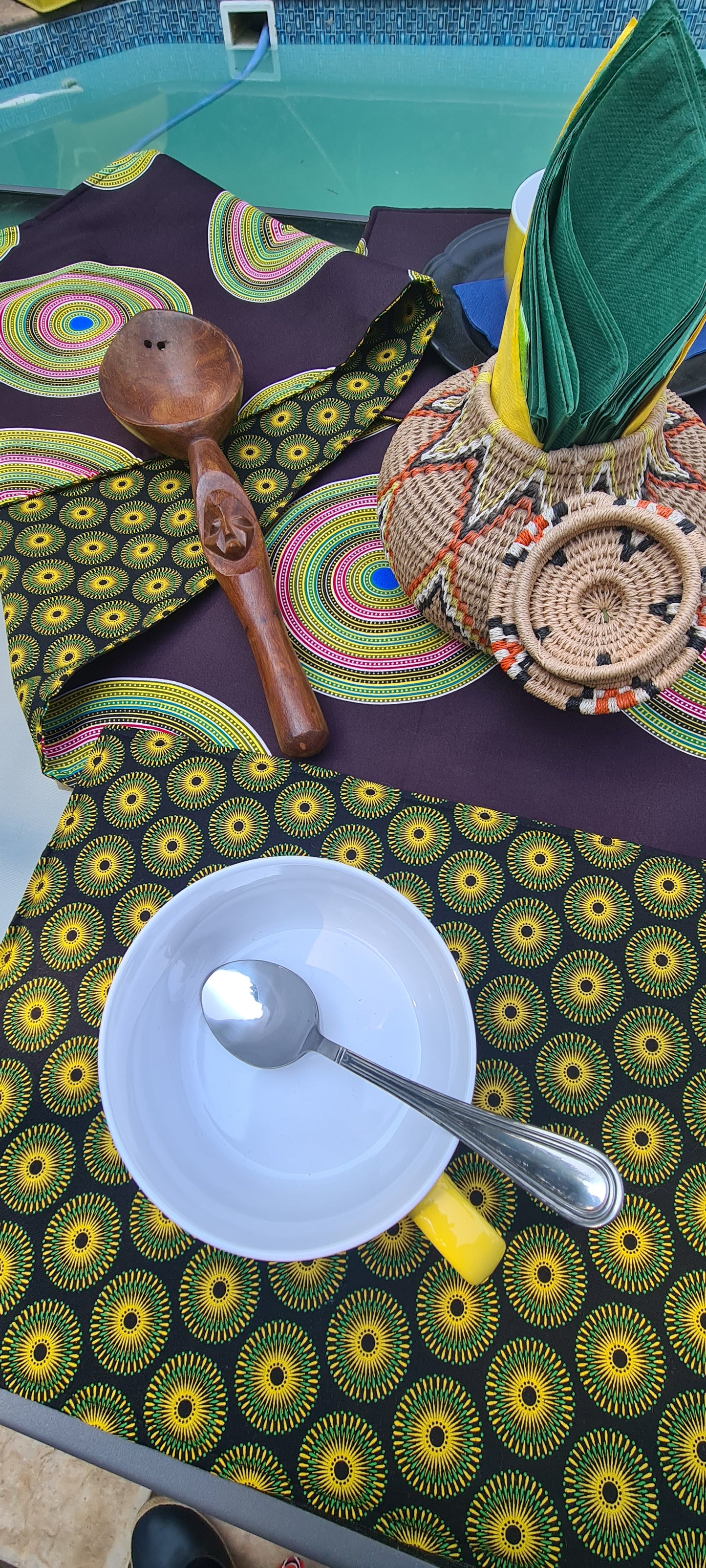 Black reversible table runner with matching place mats